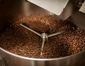 roasted coffee beans in Loring roaster